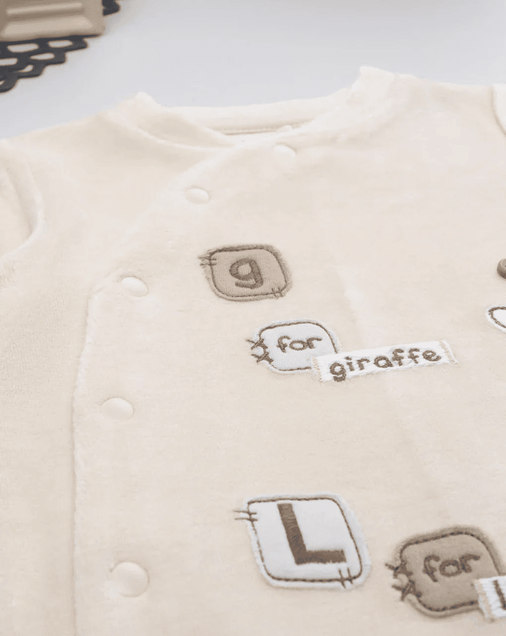 Prenatal ,Beige giraffe/lion baby onesie